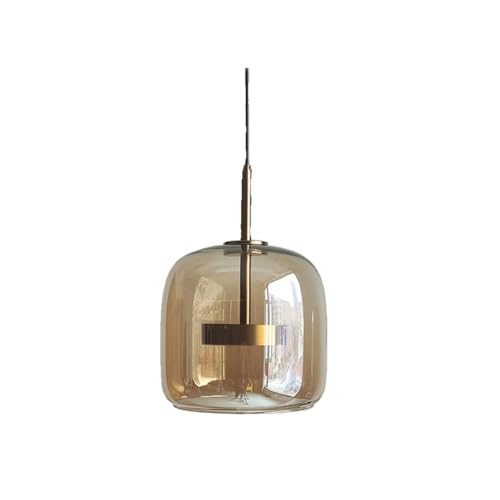 Suspension globe dorée pour éliminer les ombres sur votre îlot de cuisine