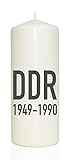 creme-farbene Kerze mit Aufdruck, eingewickelt in Seidenpapier. Von spruchkerze.DE, einer Marke von WB wohn trends