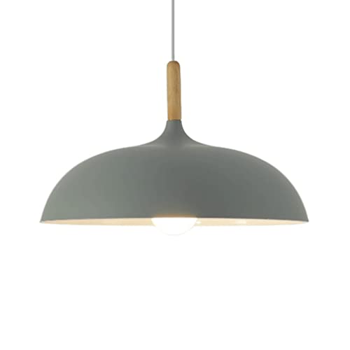 Lustre industriel pour éclairer efficacement une table de repas sombre