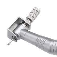 Primeiro plano view of the dental bur chuck mechanism on the handpiece head