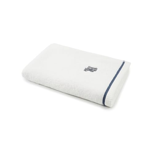 Serviette de douche blanche Tommy Hilfiger pour une routine spa
