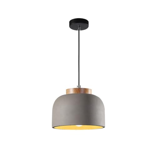 Lustre moderne cylindrique en béton réglable pour éliminer les ombres sur un îlot de cuisine