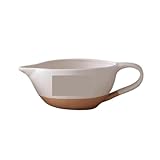 Le bec verseur bien conçu empêche l'eau de couler sur la table.