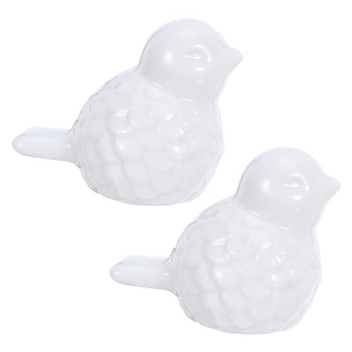 Tapas para tornillos de inodoro en forma de pájaro para crear un baño de estilo natural y limpio