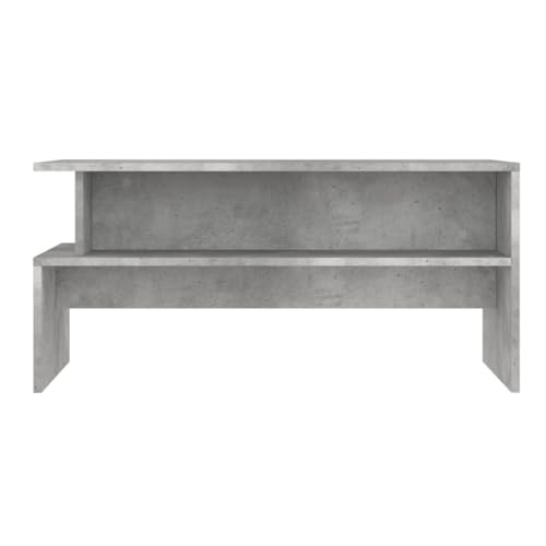 Table basse gris béton avec rangement pour optimiser l'espace du salon