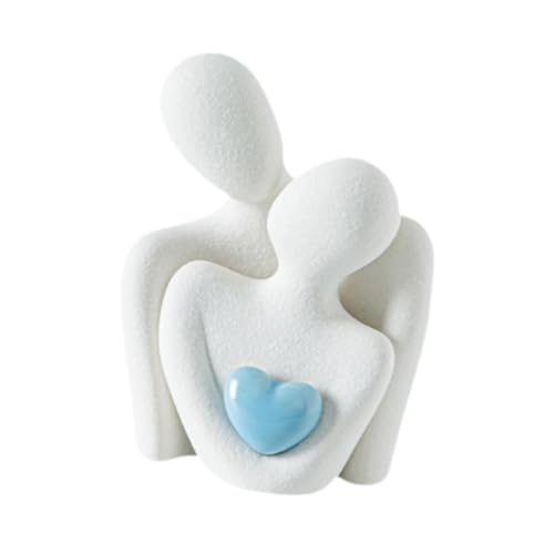 Statue d'amoureux câlins en céramique sur une étagère de salon design