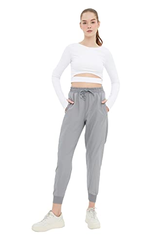 Jogger loose femme sport gris avec détails en tissu parachute de qualité supérieure