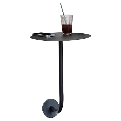 Table basse murale ronde pour optimiser les studios étroits