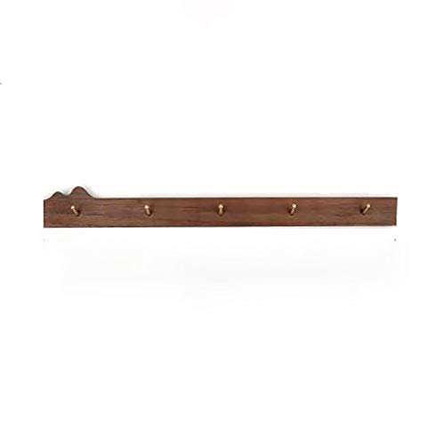 Porte-manteau en noyer et laiton pour optimiser le rangement de la salle de bain