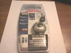 Nokia handsfree Speakerphone Compatible Model HS7201 for use with 2200/3100/3200/3300/3400/3500/8200/8300/8800 Series. Battery Charger Included