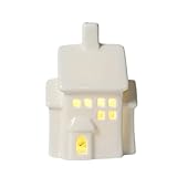 Facile organizzazione delle vacanze: basta inserire le batterie altrimenti installare per illuminare la casa del villaggio di Natale