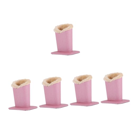 Support de lunettes en peluche rose pour sécuriser vos montures sur la table de nuit