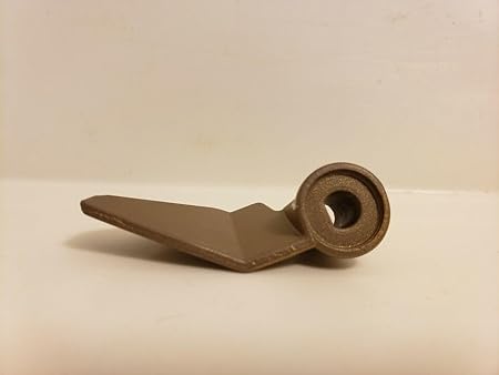 Bread machine kneading paddle, black color, shown from the top.