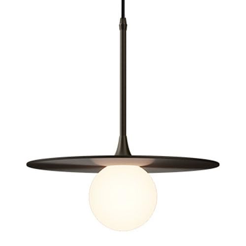 Plafonnier industriel en cuivre pour illuminer un salon sombre