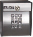 Davant view of the DoorKing 1503 Keypad, showing the numeric keypad and a key lock at the top.