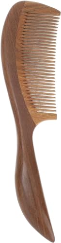 Peigne vert en bois de santal traditionnel pour le rituel des cheveux bouclés