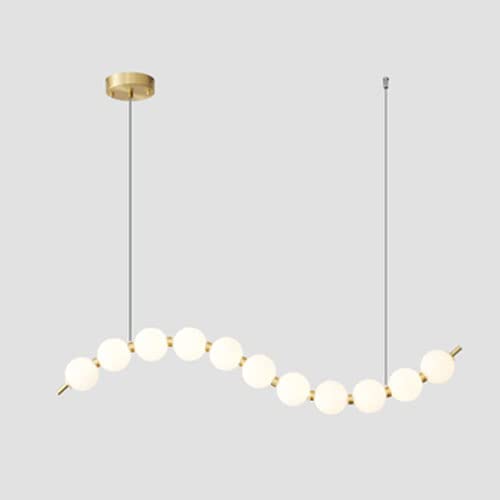 Éclairage de table insuffisant ? Adoptez ce grand lustre en cuivre de 120 cm pour bar