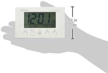 நெருக்கமான காட்சி view of the battery compartment of the RHYTHM 8RZ166SR03 alarm clock with two AA batteries inserted.