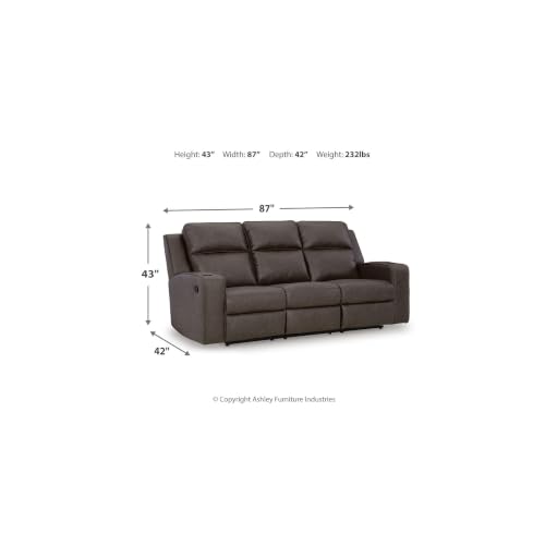 Image of Signature Design by Ashley Lavenhorne Faux Leather Manual Reclining Sofa | Heavyweight padded faux leather couch, Drop down table with 4 cup holders and USB ports, 3-in wall hugger design