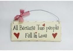 10"x4" Wooden Sign Decor - Fell in Love, 10"x4" Wooden Sign Plaques for Your Home. Adds a Great Touch to Any Home. The Sign Says "All Because Two People Fell in Love." Painted to Look Like an Antique. Comes Ready to Hang with Wire and Bow As Shown in Picture.