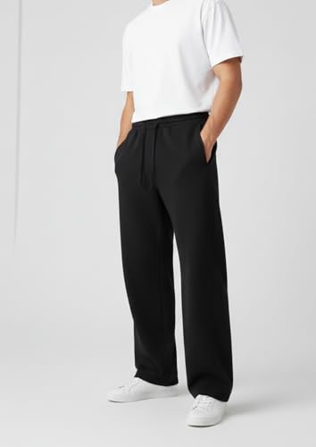 Image of Aesthetic Gothic Wide Leg Pants for Men | Tribal Print Baggy Streetwear | Oversized Track Pants with Elastic Waist | Black and White Relaxed Fit Bottoms