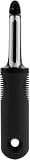 Peeler - Pelador de verduras de acero inoxidable ergonómico, color negro