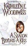 A Season Beyond a Kiss by Woodiwiss, Kathleen E. [Paperback]