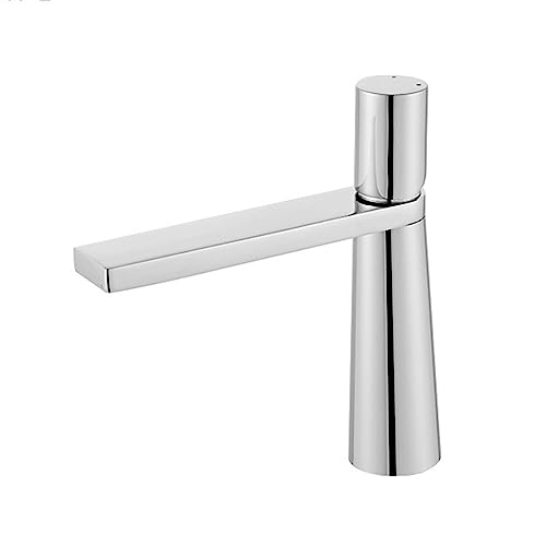 Robinet de lavabo doré pour créer une ambiance spa dans la salle de bain