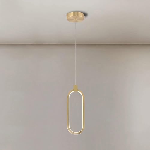 Luminaire suspendue longue en laiton pour créer une ambiance de chevet cocooning