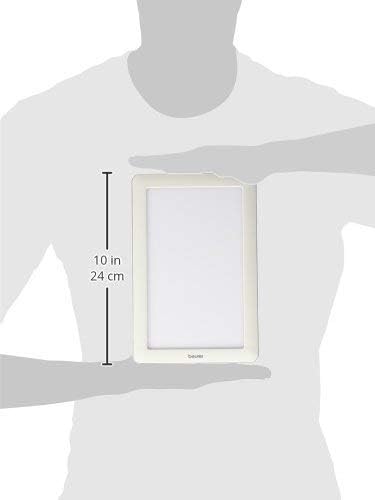 Person holding Beurer TL30 Daylight Lamp, showing dimensions