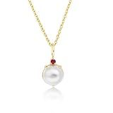 Or jaune éclatant et pierres précieuses (rubis et diamant) pour un éclat exceptionnel
