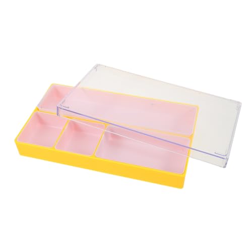 Boîte de rangement plastique jaune pour stocker vos pièces de montre de voyage