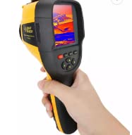 Hand holding the ST9450 Thermal Imager, showing the display in use