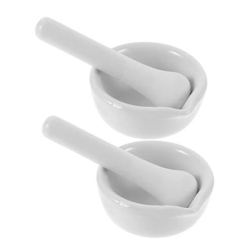 Mortero de porcelana con mano para medicina y cocina