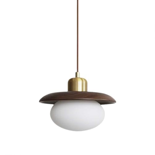 Lámpara minimalista de vidrio ovalado ideal para iluminar la mesa del comedor