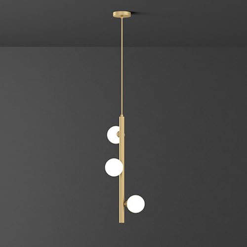 Lustre en laiton 3 lumières pour éclairer un salon sombre sans éblouir les yeux