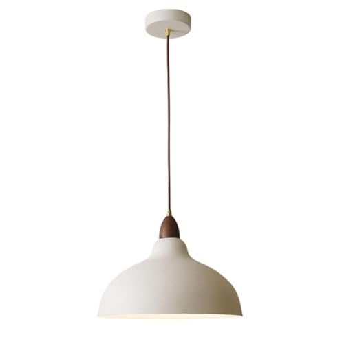 Lustre danois pour remplacer un éclairage agressif par une lumière tamisée de salle à manger