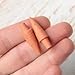 Package of 12 Tiny Miniature Orange Resin Bent Carrot Noses for Crafting, Creating Snowmen and Embellishing