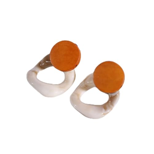 Boucles d'oreilles en argent et bois naturel : l'alliance noble du géométrique