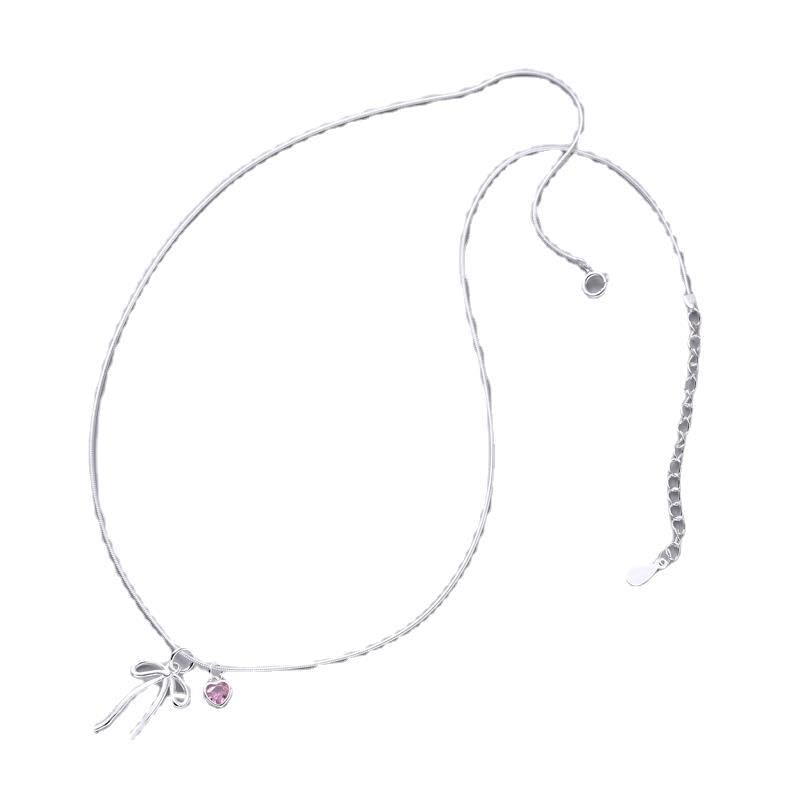 Collier en argent 925 de haute joaillerie avec cœur étincelant aux reflets roses