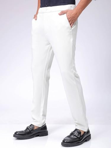 Image of The Indian Garage Co Men Slim Fit Solid Mid-Rise Stretchable Knitted Jogger Trousers