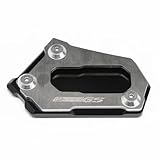 Elle augmente la surface de contact entre la béquille et le sol, améliorant ainsi l'adhérence.