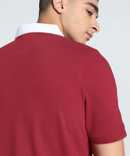 Image of Puma Men Cotton Solid Regular Fit Polo T-Shirt for Both Sporty Outings and Casual Daywear