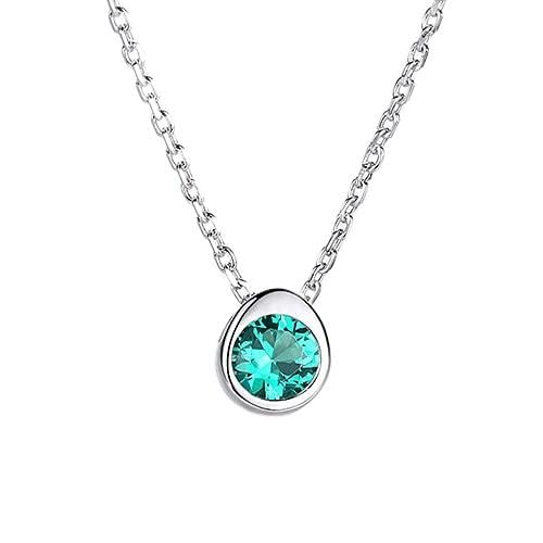 Colliers à pendentif rond et pierres précieuses pour sublimer vos tenues de fête