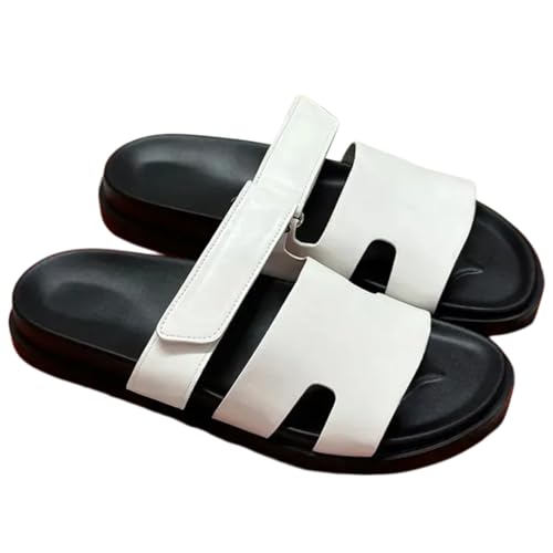 Cuir confortable et finitions premium pour ces mules plates
