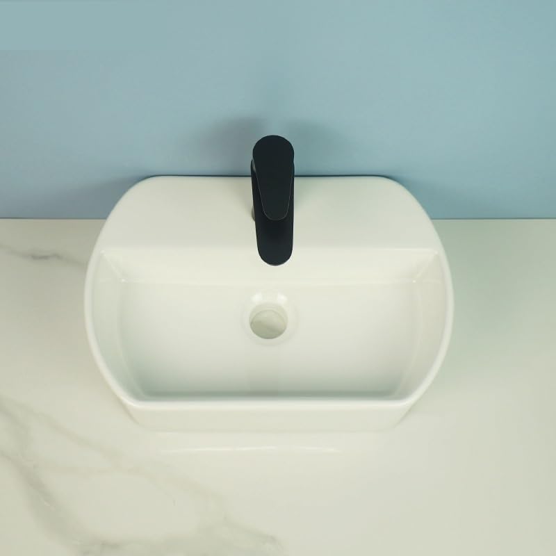 Lavabo de pared ovalado ideal para ahorrar espacio en aseos compactos 6