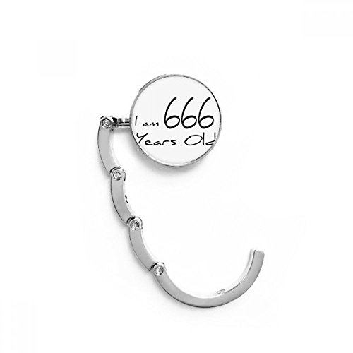 Colgador de bolso para mesa portátil y resistente con diseño original de 666 años