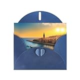 Weihnachtskarten – Dieses Set enthält 10 gemusterte Weihnachtskarten mit Sonnenuntergang in Barcelona und 10 passende blaue Umschläge