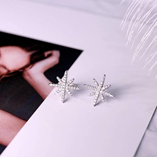 Boucles d'oreilles à pompon et étoile en argent, le cadeau idéal