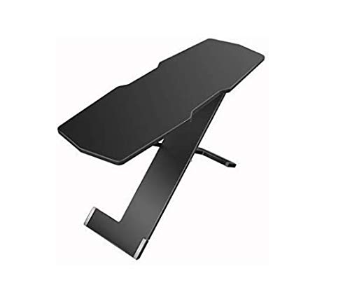 Table basse pliante noire compacte pour optimiser l'espace de votre studio